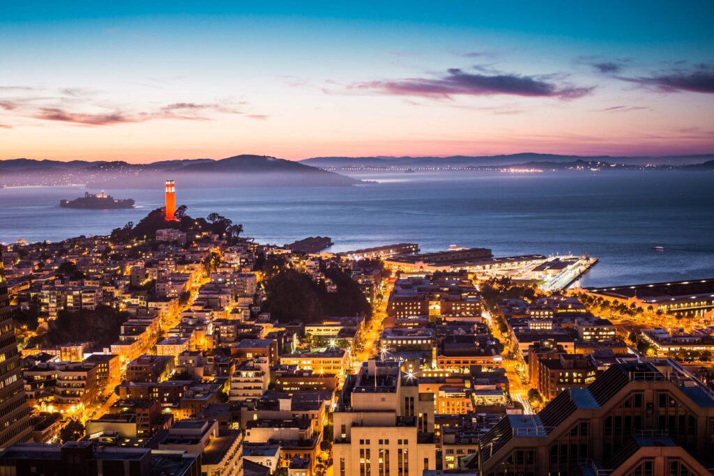 Coit Tower, Alcatraz and Part of San Francisco Bay At Night Free Photo