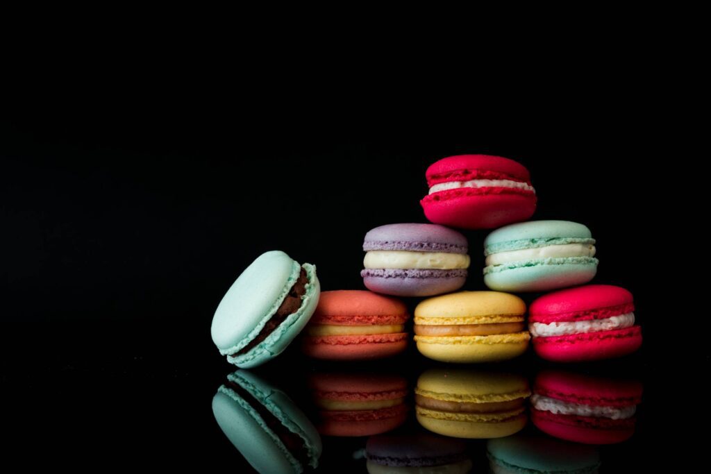 Colorful Macarons Still Life Black Background Free Photo