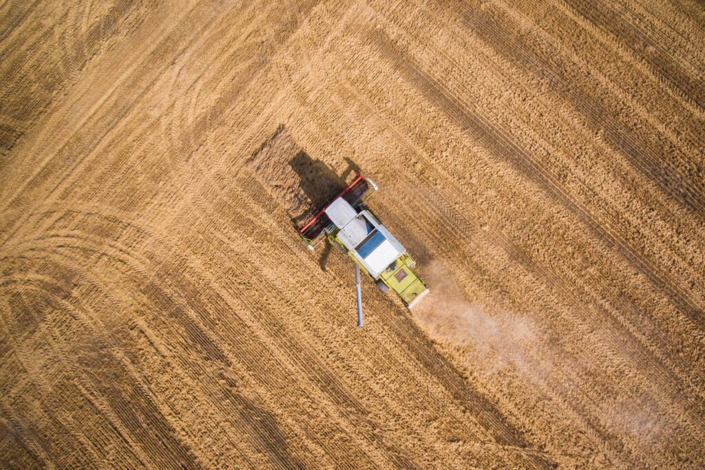 Combine Harvester at Work from Bird’s Eye View Free Photo