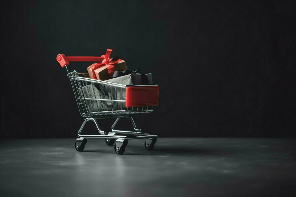 Composition of black friday shopping cart with gift boxes or bags on dark background and copy space concept by AI Generated Stock Free