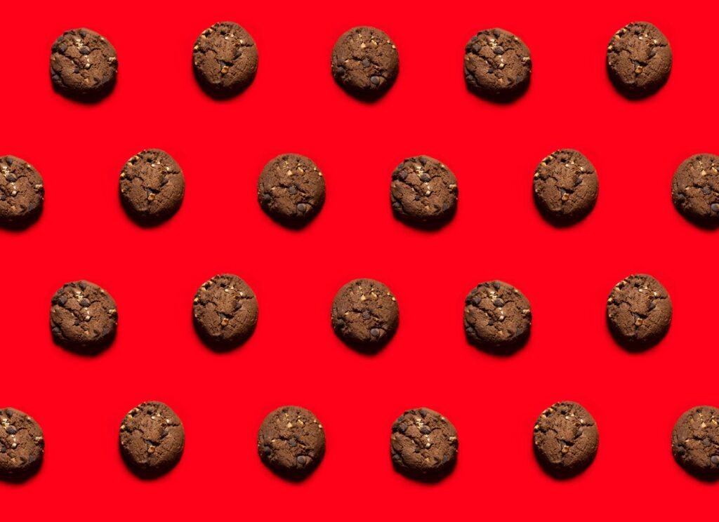 Cookies Flat Lay with Red Background Free Photo