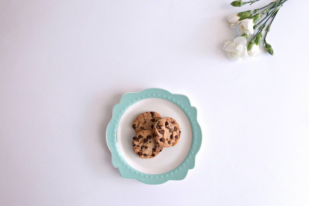 Cookies Served on a Vintage Plate with Flowers Free Photo