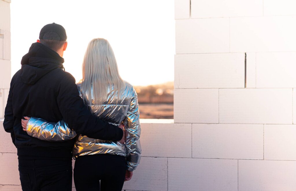 Couple Standing in Their Future House Free Photo