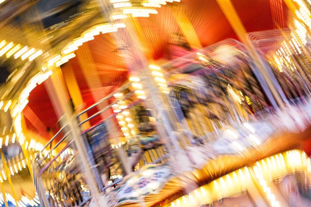 Crazy Blurred Carousel at Night Free Photo