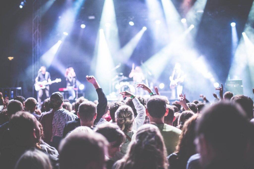 Crowds of People Partying at a Live Concert Free Photo