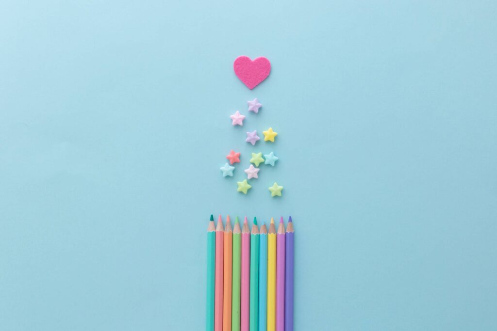 Cute Color Pencils on Pastel Background Free Photo