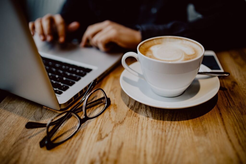 Cup of coffee on table in cafe Stock Free