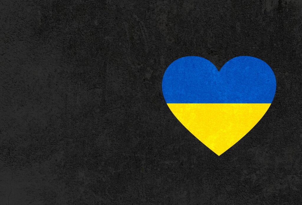 Dark Copy Space Background with Heart in Ukraine Colors Free Photo