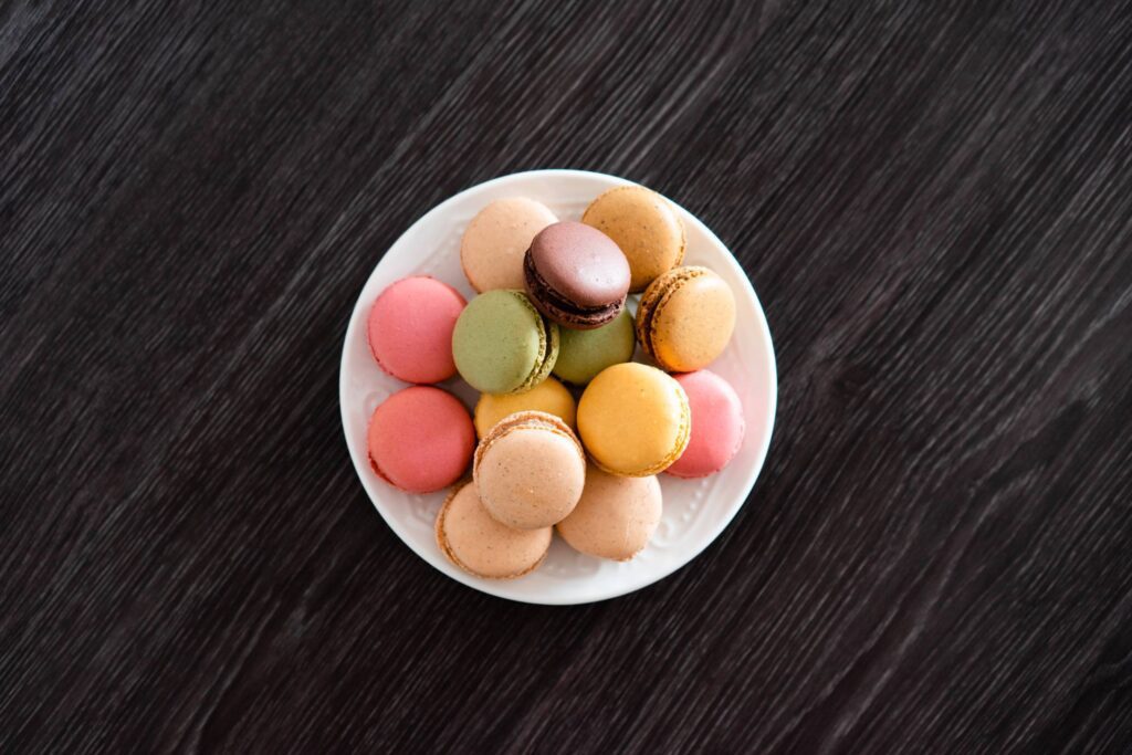 Delicate Homemade Macarons on The Black Wood Free Photo