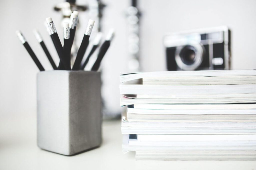 Desk With Pencils & Magazines Stock Free