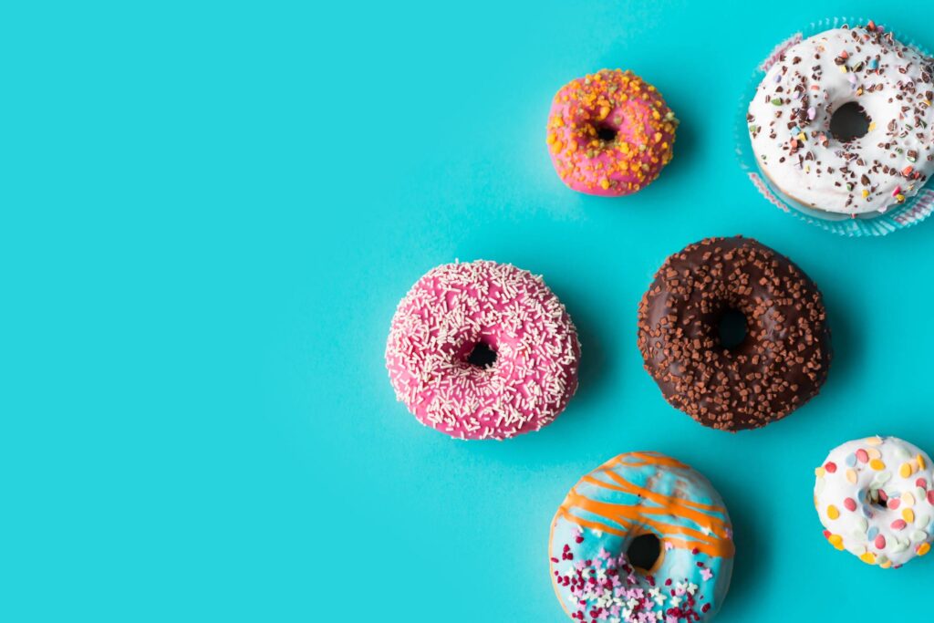 Donuts on Blue Background Free Photo