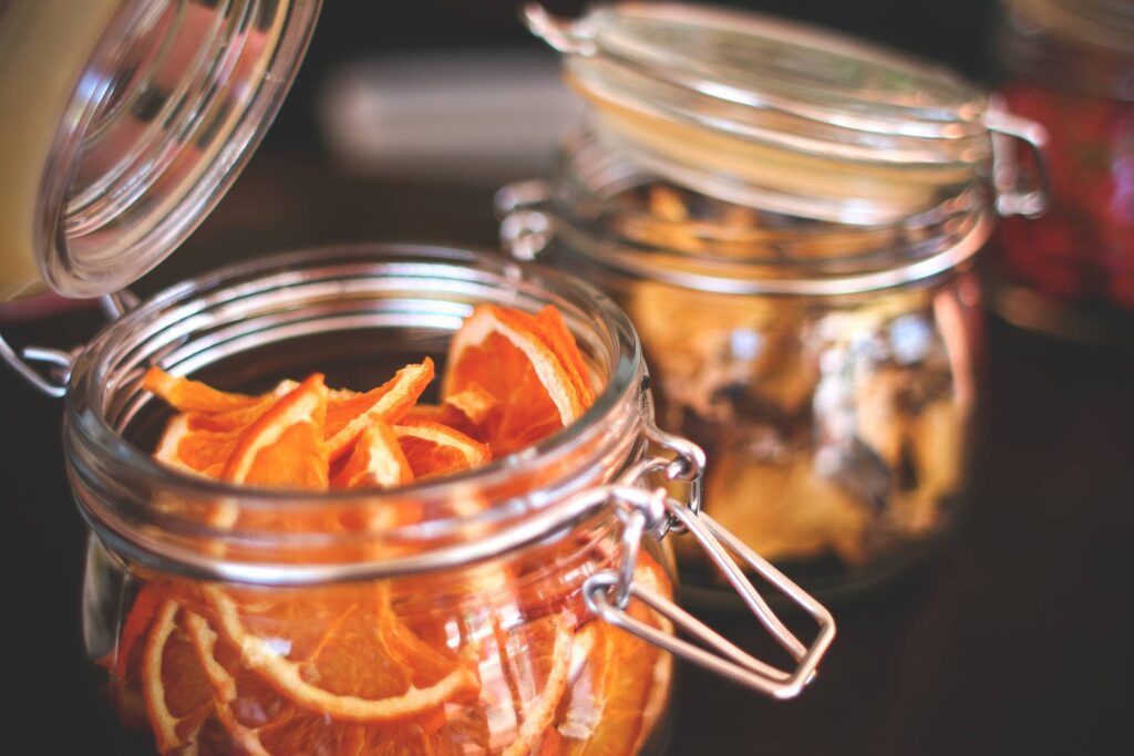 Dried Oranges in an Old Jar Free Photo