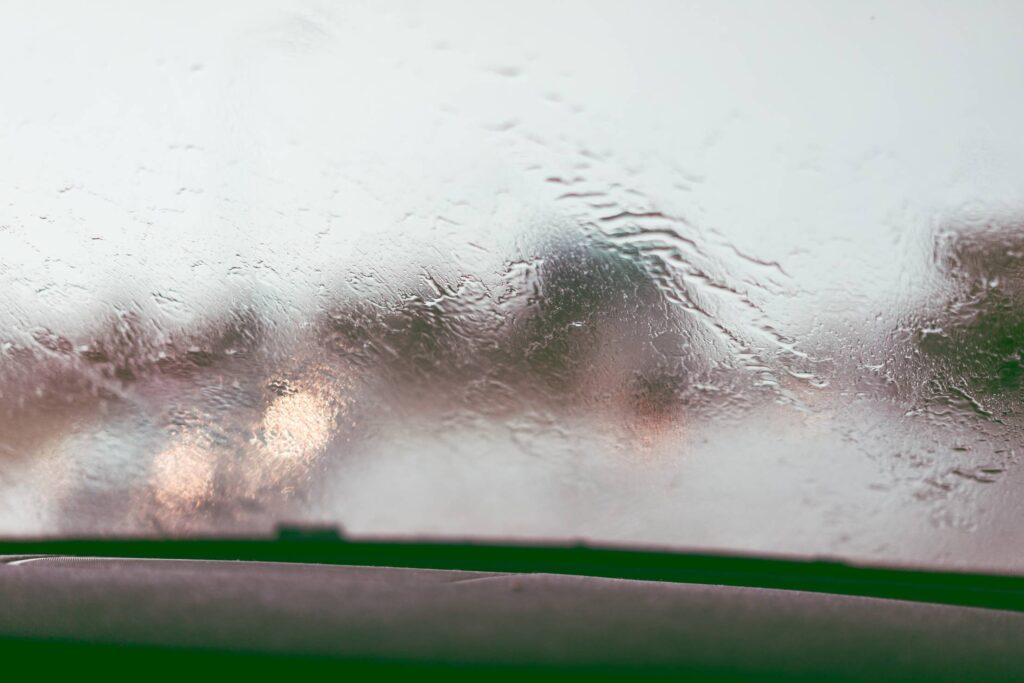 Driving in The Rain Water on Windshield Free Photo