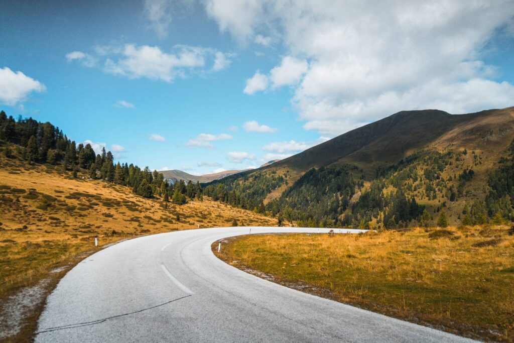 Empty Road in Austrian Mountains Free Photo