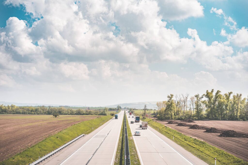 European Highway Surrounded by Fields Free Photo