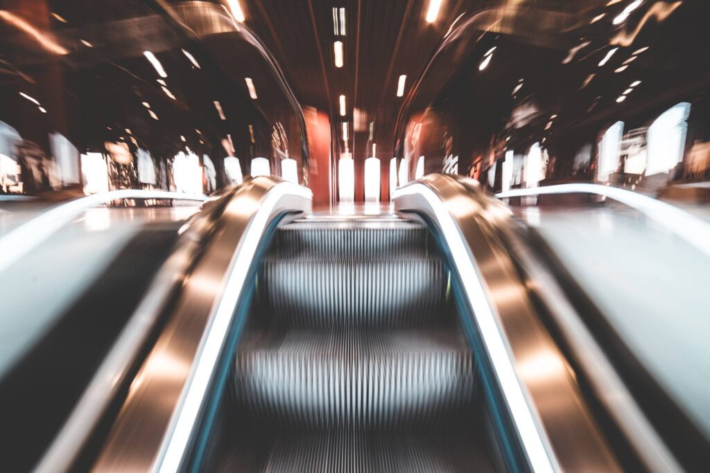 Fast Escalator and Abstract Lights Free Photo