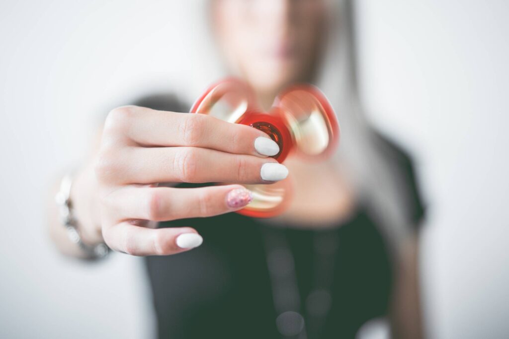 Fidget Spinner in Woman Hand Free Photo