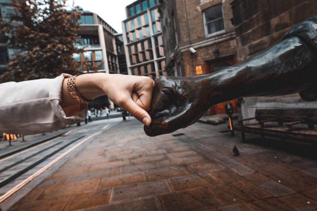 Fist Bump with Cordwainer Statue, London Free Photo