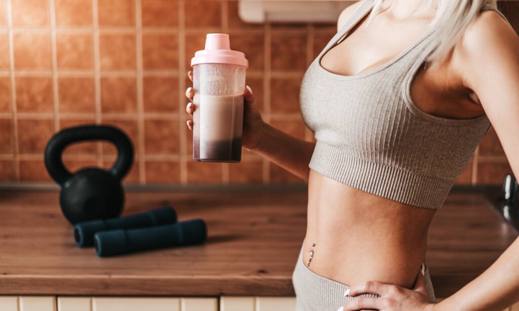 Fitness Woman is Drinking Protein Shake After Workout Free Photo