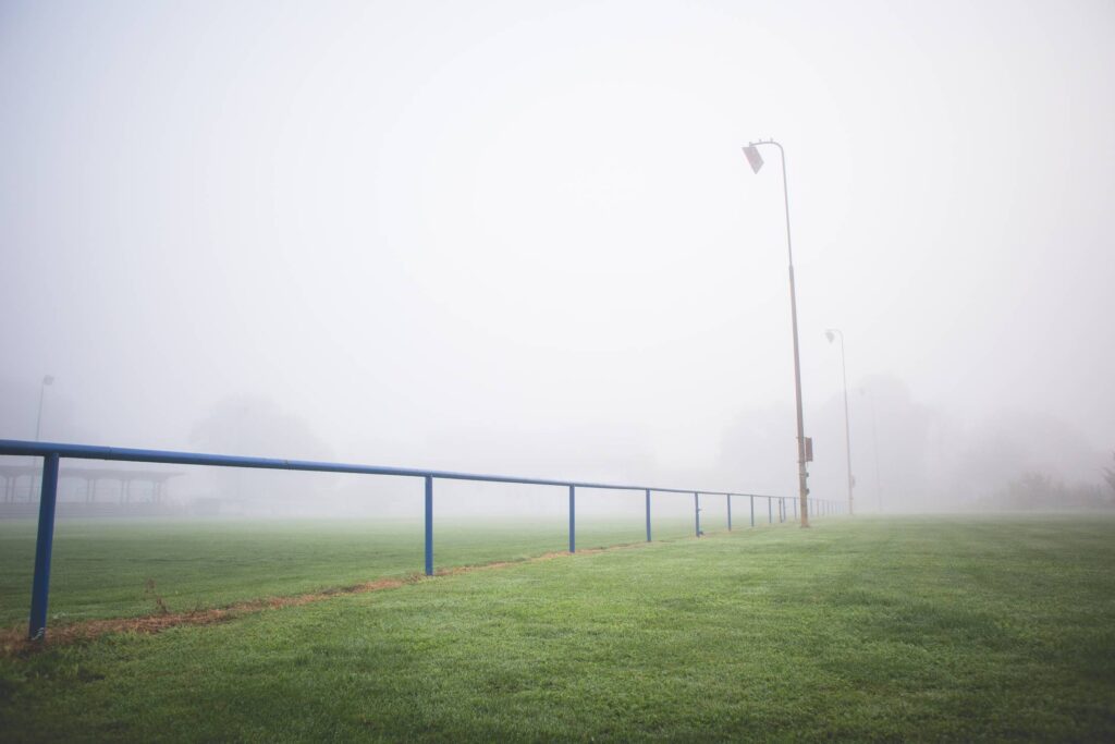 Foggy Football Pitch in the Morning Free Photo