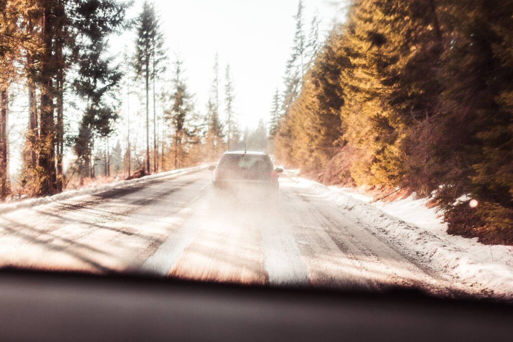 Following a Car on Forest Road Free Photo