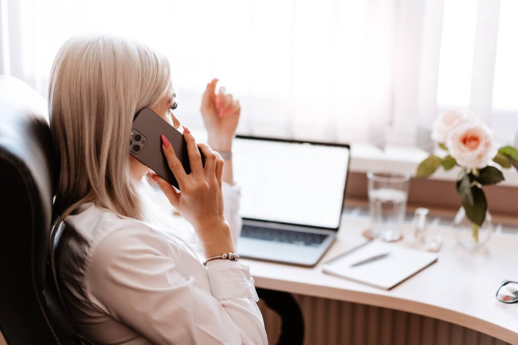 Freelance Woman Entrepreneur Calling in Home Office Free Photo