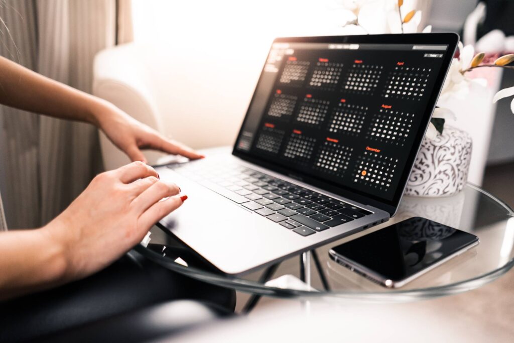 Freelance Woman Working on Her MacBook Free Photo