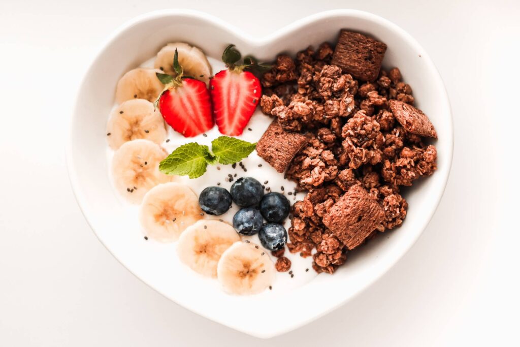 Fresh & Healthy Breakfast in Heart-shaped Bowl Free Photo