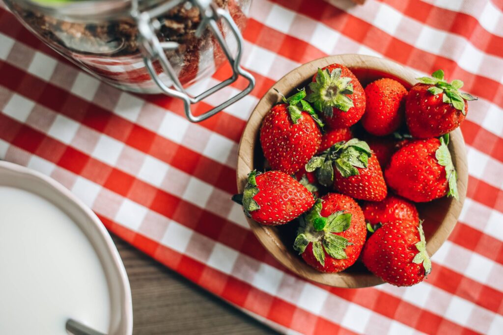 Fresh Strawberries in a Wooden Bowl Free Photo