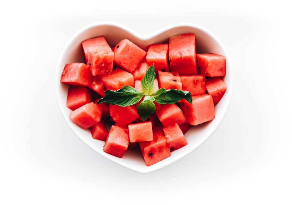 Fresh Watermelon in Heart-Shaped Bowl Free Photo