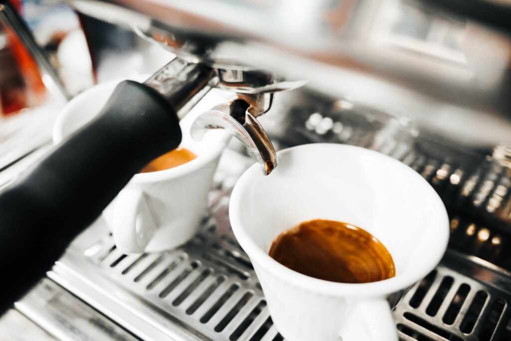 Freshly Brewed Coffees from Coffee Machine Free Photo