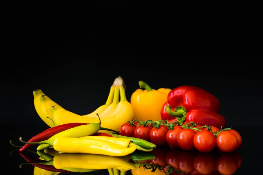 Fruits and Vegetables Still Life and Black Background Free Photo