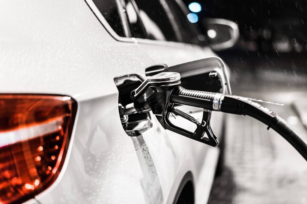 Fueling Up a Car at a Petrol Station Free Photo