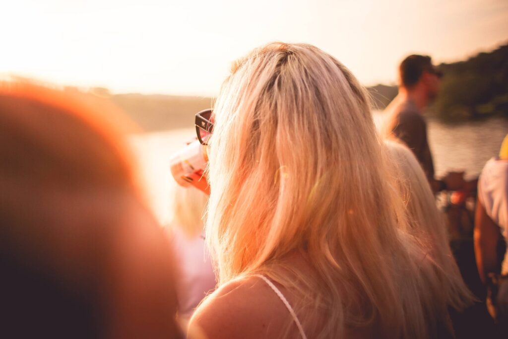 Girl Drinking in Sunlights Free Photo