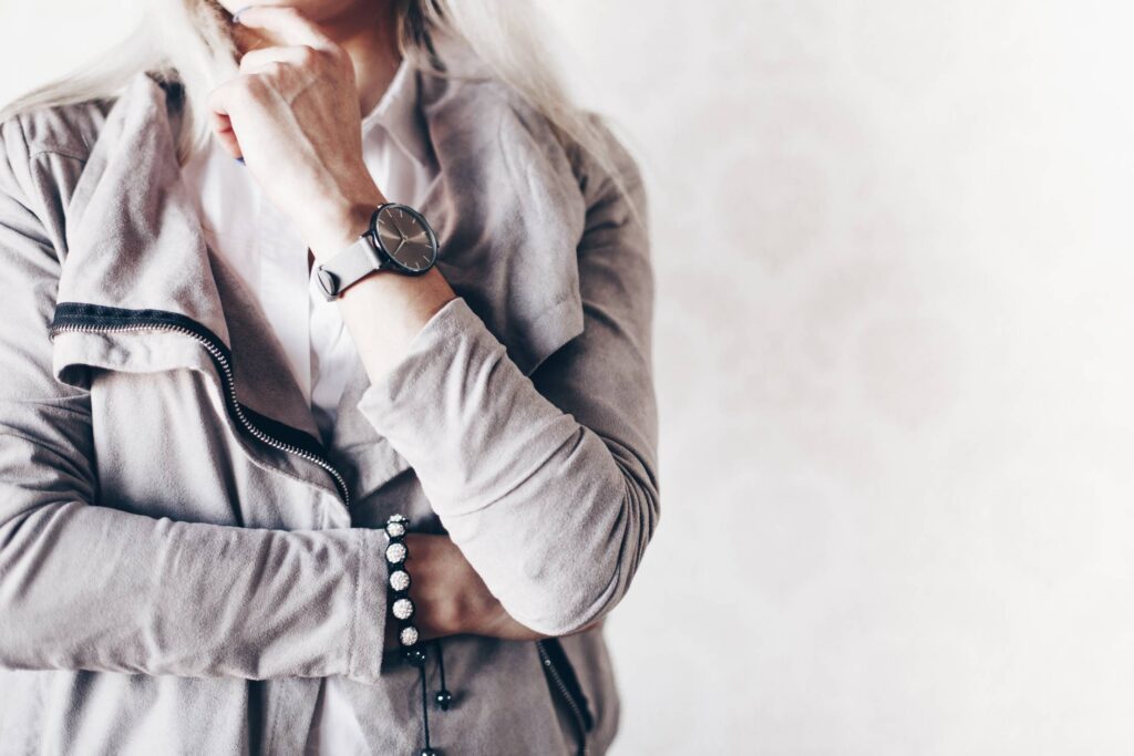 Girl Fashion Pose with Gray Watches and Suede Jacket Free Photo