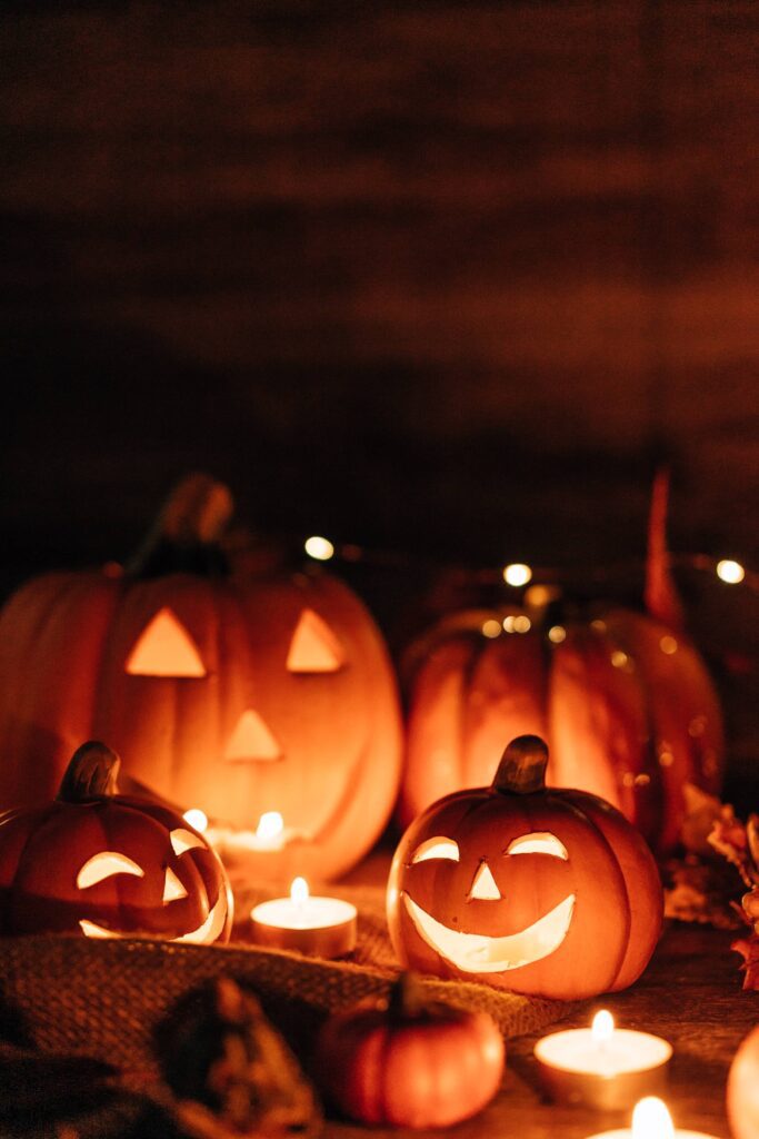 Glowing Halloween Pumpkins at Night Free Photo