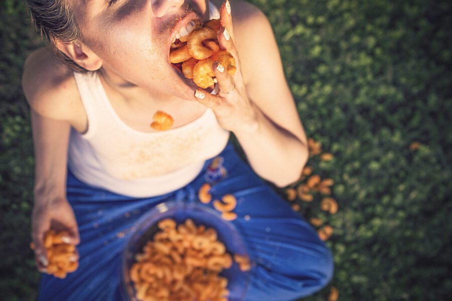 Man Eating Chips Free Stock Photo