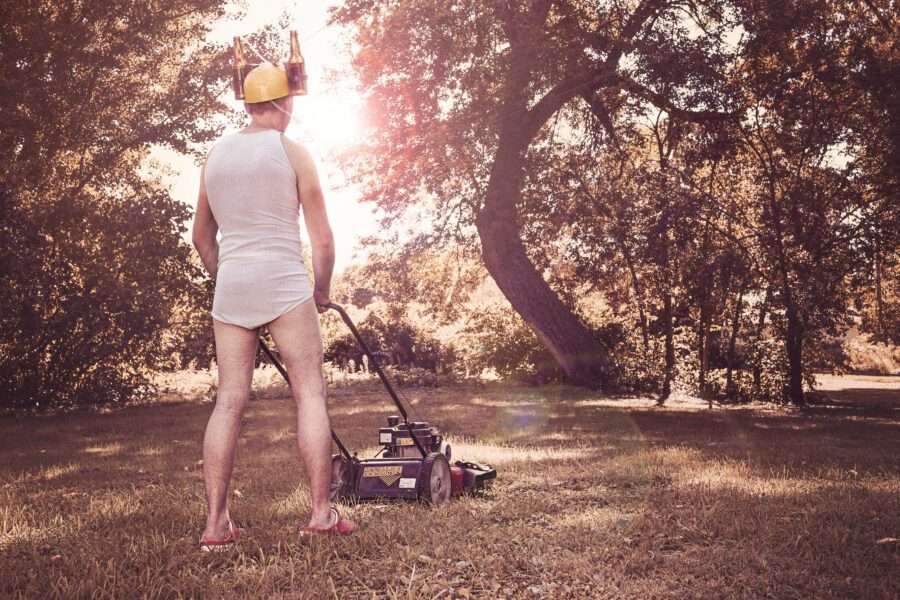 Man Mowing Grass Free Stock Photo