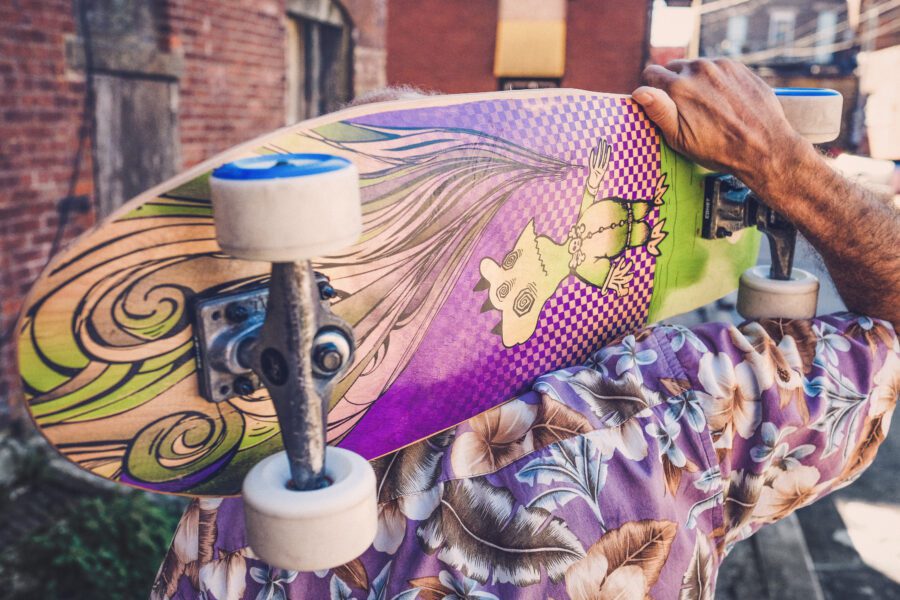 Man Holding Skateboard Free Stock Photo