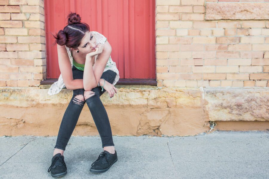 Girl Waiting on Step Free Stock Photo