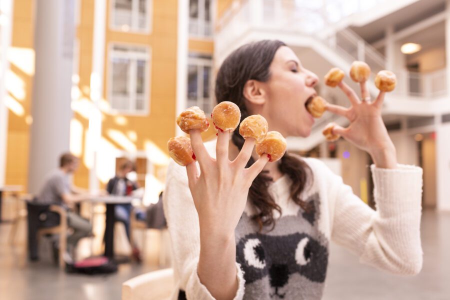 Eating Donut Holes Free Stock Photo