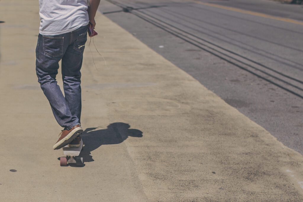 Man on Longboard Free Stock Photo