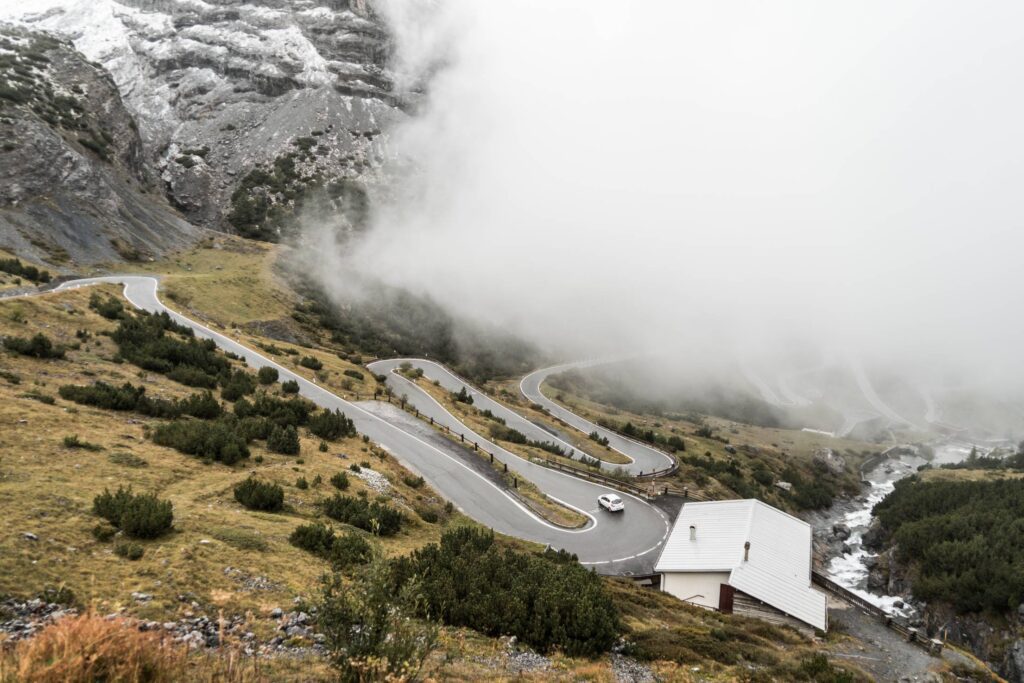 Hairpin Turns on Stelvio Pass Mountain Road in Italy Free Photo