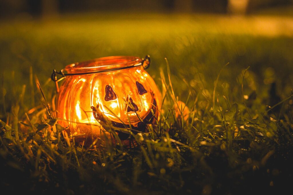 Halloween Candle Holder in Evening Grass Free Photo