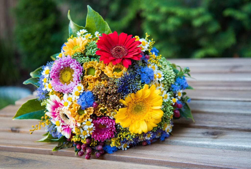 Hand-Tied Bouquet of Beautiful Colorful Flowers Free Photo