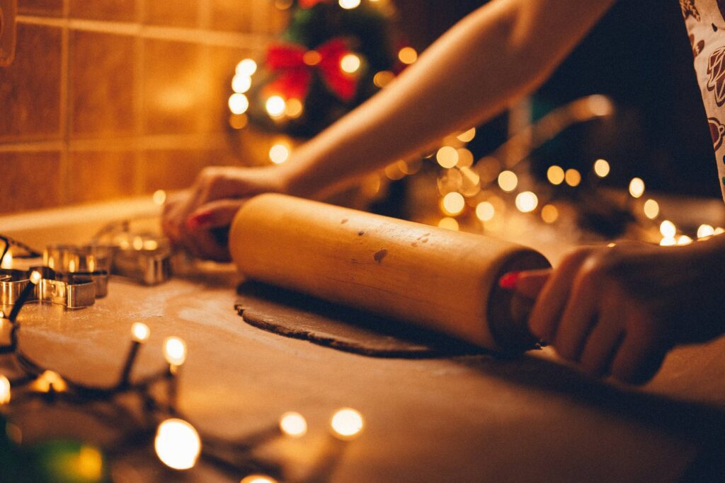 Hands Rolling Gingerbread Dough Free Photo