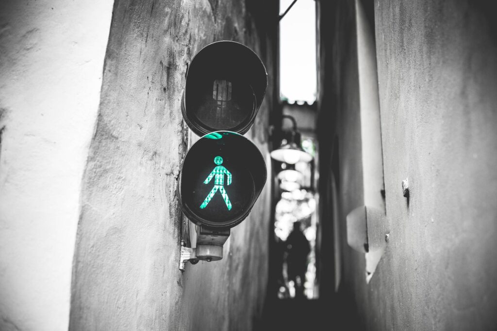 Green Traffic Light Walk Signal in Prague Narrowest Street Free Photo