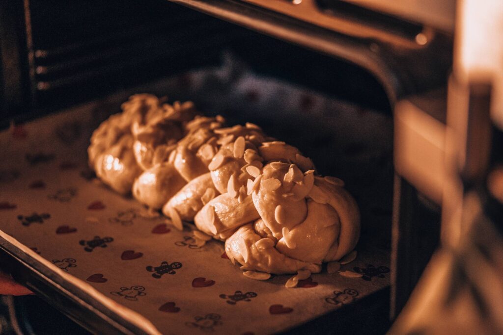 Homemade Braided Sweet Bread in the Oven Free Photo