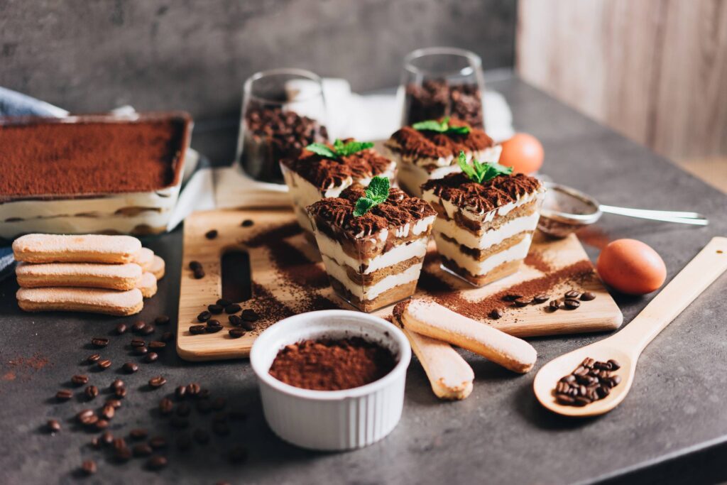 Homemade Dessert Tiramisu Served in Individual Glasses Free Photo