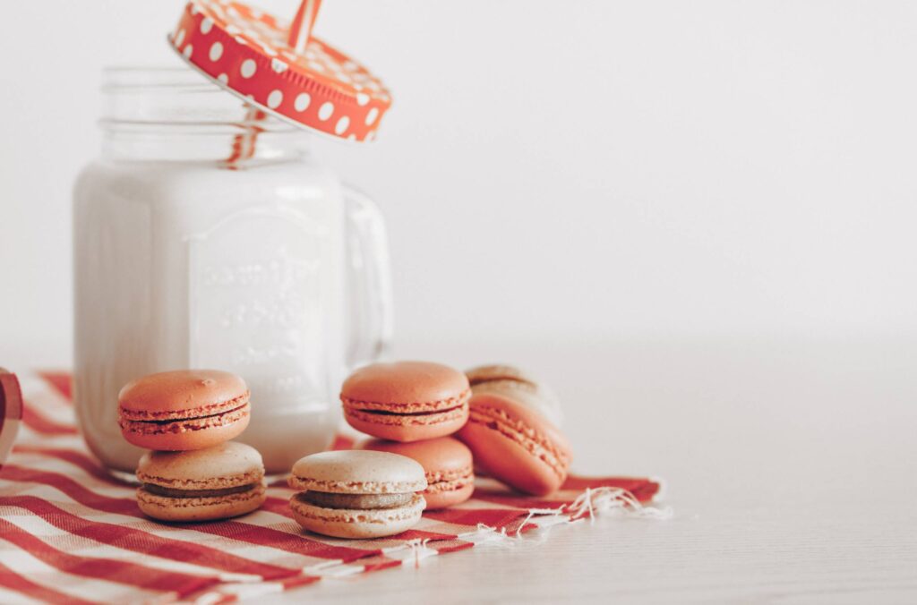 Homemade Macarons With a Glass of Milk Free Photo